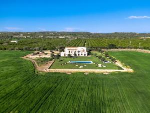 an aerial view of a house in a field at Casa Vendicari Boutique Hotel in Noto