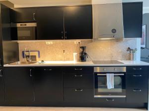 Kuchyň nebo kuchyňský kout v ubytování Magnolia House Norrviken + 37 fotografií