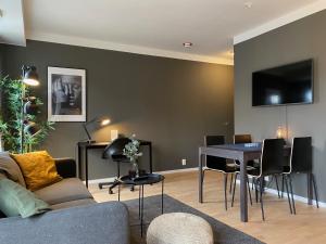 TV a/nebo společenská místnost v ubytování Magnolia House Norrviken