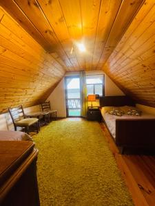 Łóżko lub łóżka w pokoju w obiekcie Siedlisko Zatoka