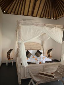 Ліжко або ліжка в номері Uma Kama Villa
