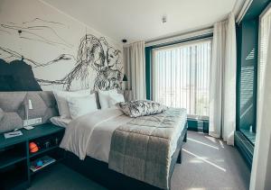 Postel nebo postele na pokoji v ubytování Hotel AX
