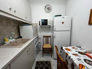 Η κουζίνα ή μικρή κουζίνα στο Your Home in the city center by GG +24 φωτογραφίες