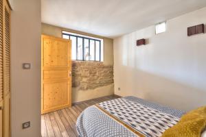 Posteľ alebo postele v izbe v ubytovaní Appartement Le Cosy - Calme & Chaleureux - Bien situé
