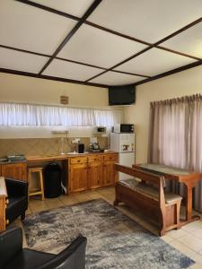 Kuchyň nebo kuchyňský kout v ubytování Profcon Resort