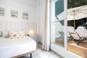 Casa Hibiscus Marbella客房内的一张或多张床位