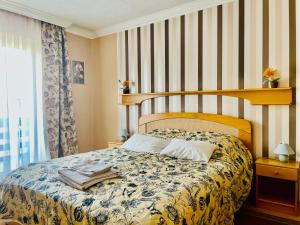 Postel nebo postele na pokoji v ubytování Villa Lux