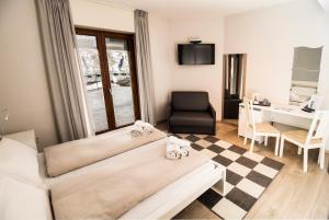 Posezení v ubytování Hotel Saligari