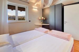 A bed or beds in a room at Residenza Ai Ferrari