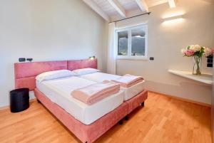 A bed or beds in a room at Residenza Ai Ferrari