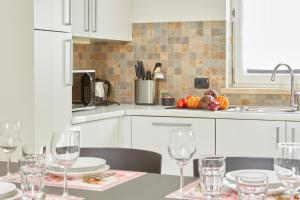 A kitchen or kitchenette at Residenza Ai Ferrari