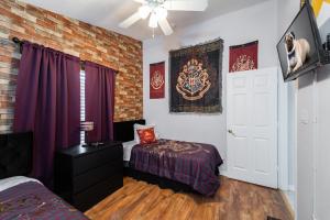 a bedroom with a bed and a window at 16150EGRET- Sun Chaser (S) in Orlando +20 photos