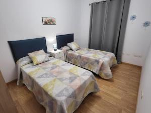 Ένα ή περισσότερα κρεβάτια σε δωμάτιο στο Casa Matele 2 bed Apt