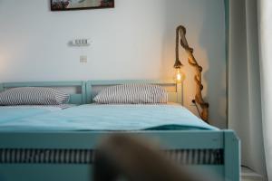Posteľ alebo postele v izbe v ubytovaní Sea View apartment Dione