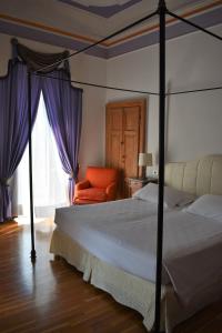 Postel nebo postele na pokoji v ubytování Hotel Florence