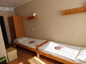 Posteľ alebo postele v izbe v ubytovaní Penzion Flipper