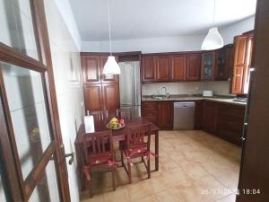 A kitchen or kitchenette at Casa Magali
