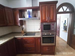 A kitchen or kitchenette at Casa Magali