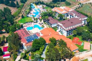 an aerial view of a resort with a pool at Orka Village Hisarönü in Fethiye