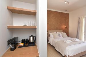 Vuode tai vuoteita majoituspaikassa Natal Suites