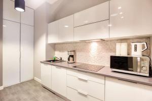 Kuchyňa alebo kuchynka v ubytovaní Floriańska Glamour Apartments
