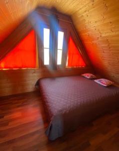 Postel nebo postele na pokoji v ubytování Faaakersee Familyhouse - mit PrivatStrand- Seeblick