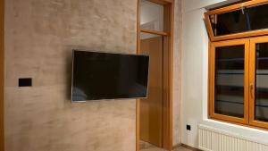 TV a/nebo společenská místnost v ubytování Corso Apartment
