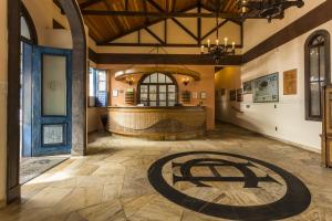 a large room with a large circle on the floor at VOA Hotel Caxambu in Caxambu