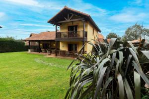 Zahrada ubytování Chalet El Ñeru