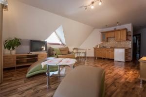 Kuchyňa alebo kuchynka v ubytovaní Sykowny Dworek Apartamenty