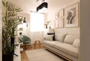 אזור ישיבה ב-Elegant flat in the city centre with two suite