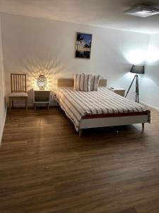 Posteľ alebo postele v izbe v ubytovaní Apartament cozy