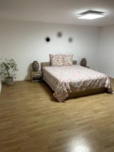 Postel nebo postele na pokoji v ubytování Apartament cozy