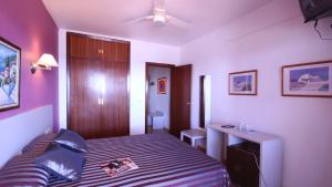 Postel nebo postele na pokoji v ubytování Hostal Velilla