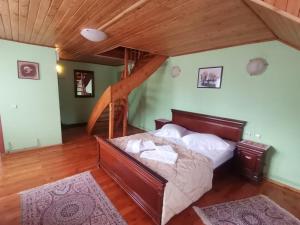 Postel nebo postele na pokoji v ubytování Pensiunea Dapa + 37 fotografií