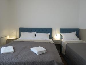 Ένα ή περισσότερα κρεβάτια σε δωμάτιο στο Premium NB Apartment - Belgrade Waterfront