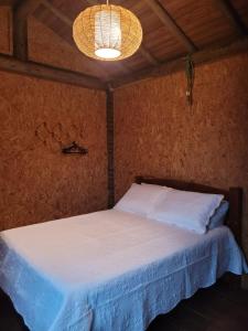 Ένα ή περισσότερα κρεβάτια σε δωμάτιο στο Casa Charmosa