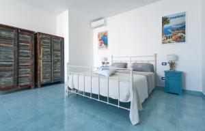 Postel nebo postele na pokoji v ubytování Le Dimore Turchesi by BarbarHouse
