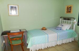A bed or beds in a room at Polytropon Apartments