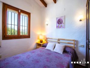 Llit o llits en una habitació de VH CostaBlanca - OSALVA 22 fotos més