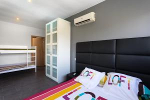 Postel nebo postele na pokoji v ubytování Family-friendly villa in Lloret de Mar with private pool