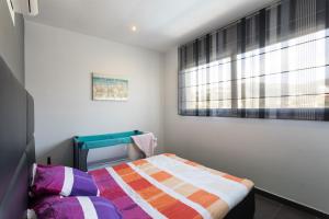 Postel nebo postele na pokoji v ubytování Family-friendly villa in Lloret de Mar with private pool