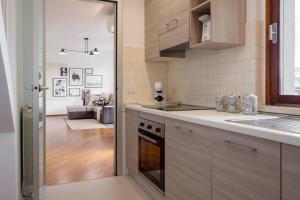 A kitchen or kitchenette at Exclusive penthouse with 60 m2 panoramic terrace