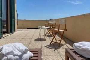 A balcony or terrace at Exclusive penthouse with 60 m2 panoramic terrace
