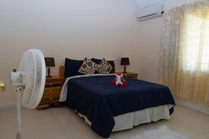 Ένα ή περισσότερα κρεβάτια σε δωμάτιο στο Smart villa @ Richmond +12 φωτογραφίες