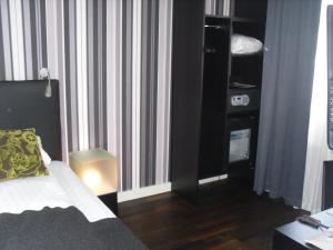 Letto o letti in una camera di First Hotel Witt