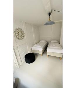 Säng eller sängar i ett rum på ApartmentInCopenhagen Apartment 1503