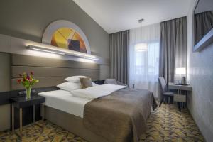 Hotel Essence客房内的一张或多张床位