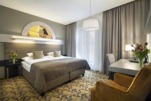 Hotel Essence客房内的一张或多张床位