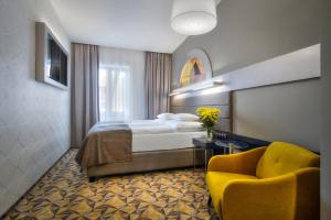 Hotel Essence客房内的一张或多张床位